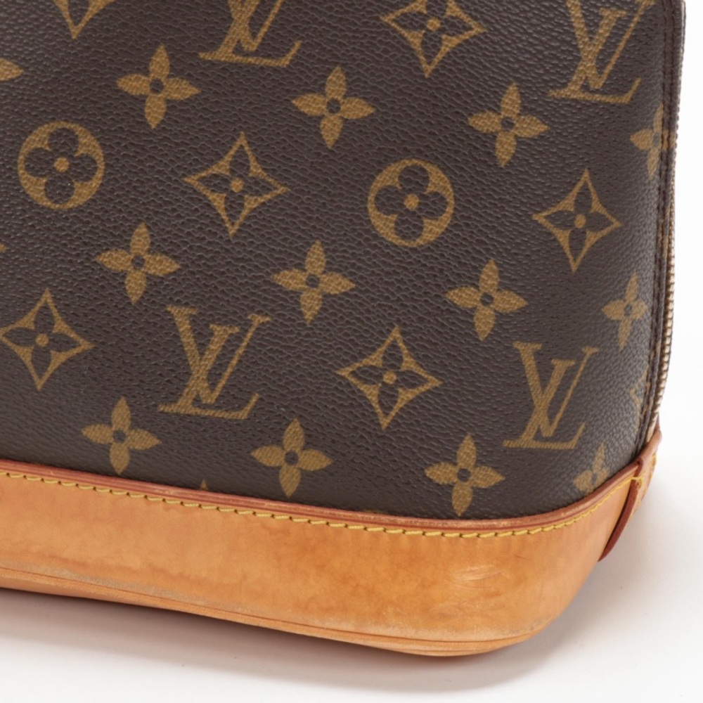 Louis Vuitton Alma PM Satchel - Picture 9 of 14